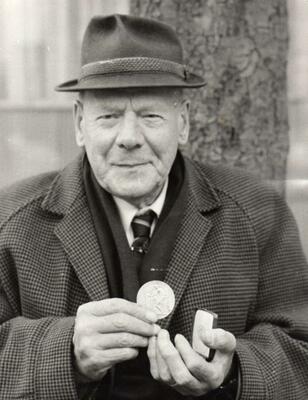 1937 William Bradley displaying his 1937 gold