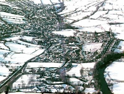 Aerial view of Addingham in 2000-12-30 in snow